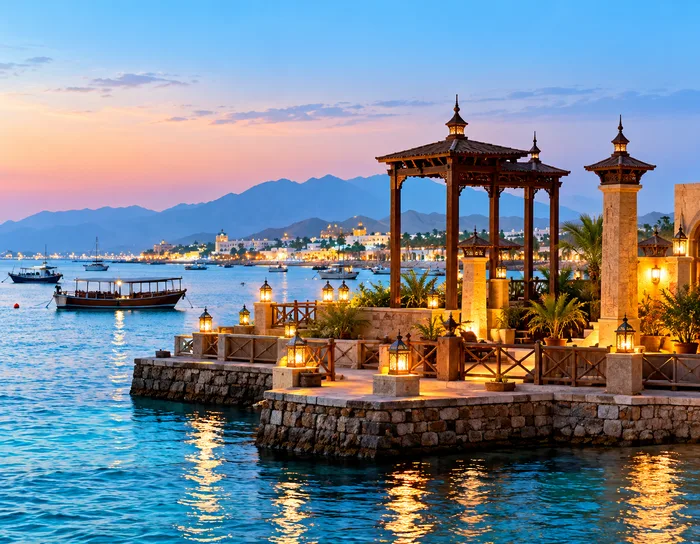 Lantern-lit pier on the Omani coast